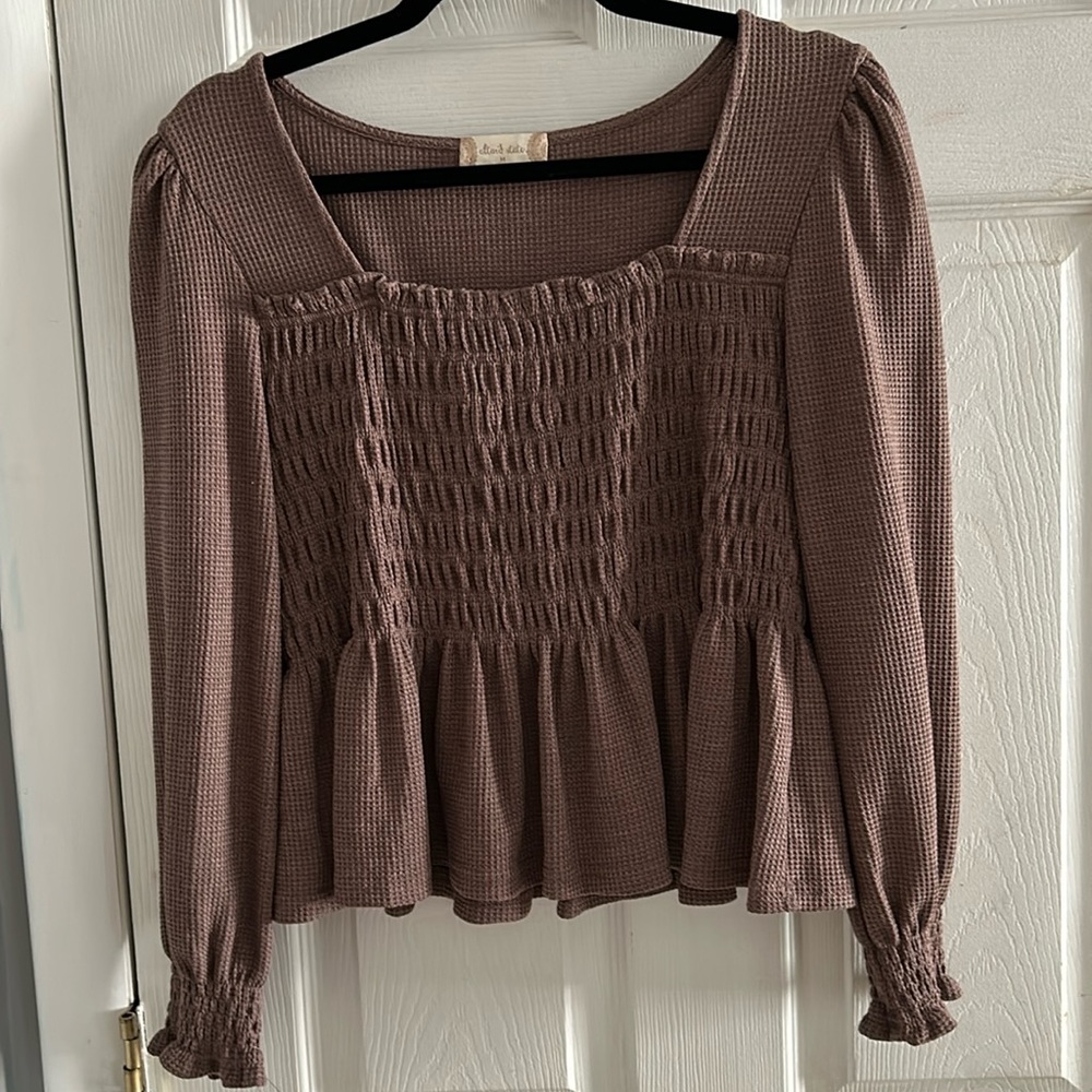 This is an altard state top with ruffles